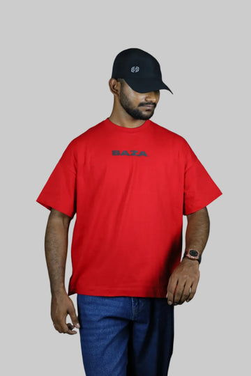 Person wearing a red shirt with 'Bally' branding on a black background